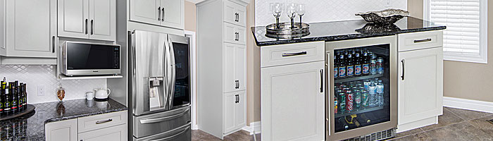 A brand new kitchen with additional beverage fridge.